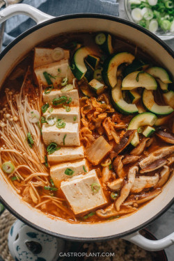 foodffs:  Vegan Kimchi JjigaeVegan Kimchi Jjigae is a simple Korean-style stew made from kimchi, mushrooms, tofu, and assorted veggies. It has a comforting balance between sweet, sour, spicy, and savory and is one of my favorite cold-weather meals. Recipe