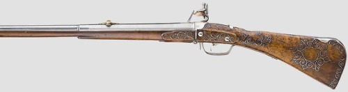 Flintlock revolving rifle (4 shot) signed “JOHANN PETRO A CARLSBAD FECIT”, circa 1720.from Hermann H