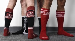 Men in rugby and footy socks