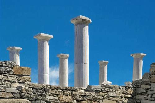 Ancient columns at the island of Delos, Greece.Delos is famous for being The Most Sacred Island in T