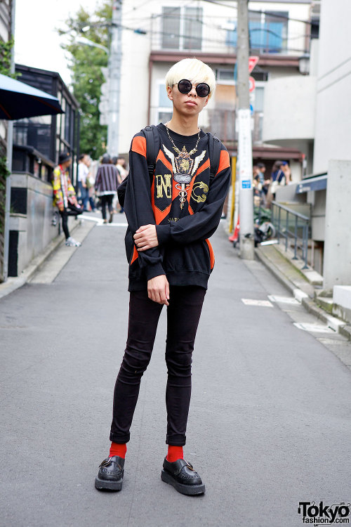 Blonde Harajuku guy w/ resale graphic sweatshirt, skinny jeans, and George Cox buckle creepers.