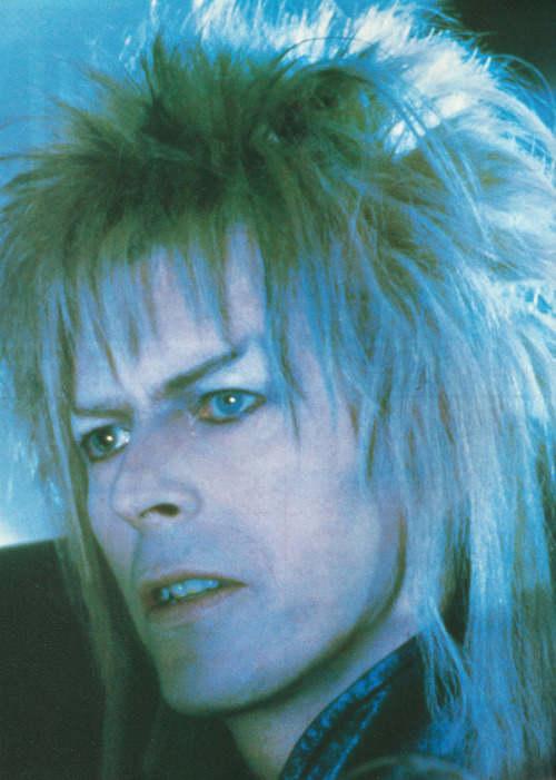 labyrinthnook:  Here’s a great shot of Bowie as Jareth from Labyrinth. This is my scan from a clipping - I’m vastly amused by the fact the other side of the clipping features an ad for a film titled Eat The Peach - it’s quite the in-joke, when you