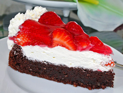delicious-food-porn:  Chocolate Almond Cake with Strawberries and Cream (German Recipe)  Oooooooh