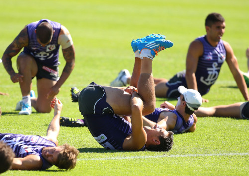 giantsorcowboys:  Ready For Play! Matthew Pavlich And Scott Gumbleton Limber Up For Action! Forward, Ho! Tap That Keg, Cowboy! 