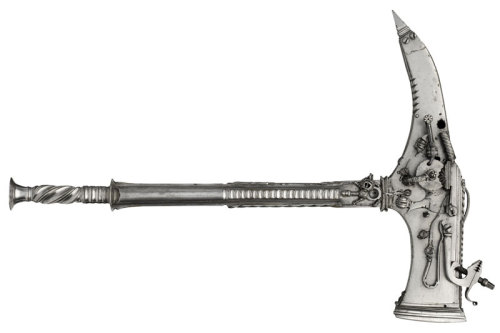 Early 17th Century Combination warhammer and warpick/six shot gun.  Has six barrels concealed on it 