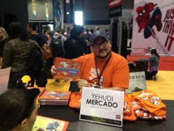 Our pal Yehudi Mercado signing copies of Pantalones, TX at the Archaia booth.