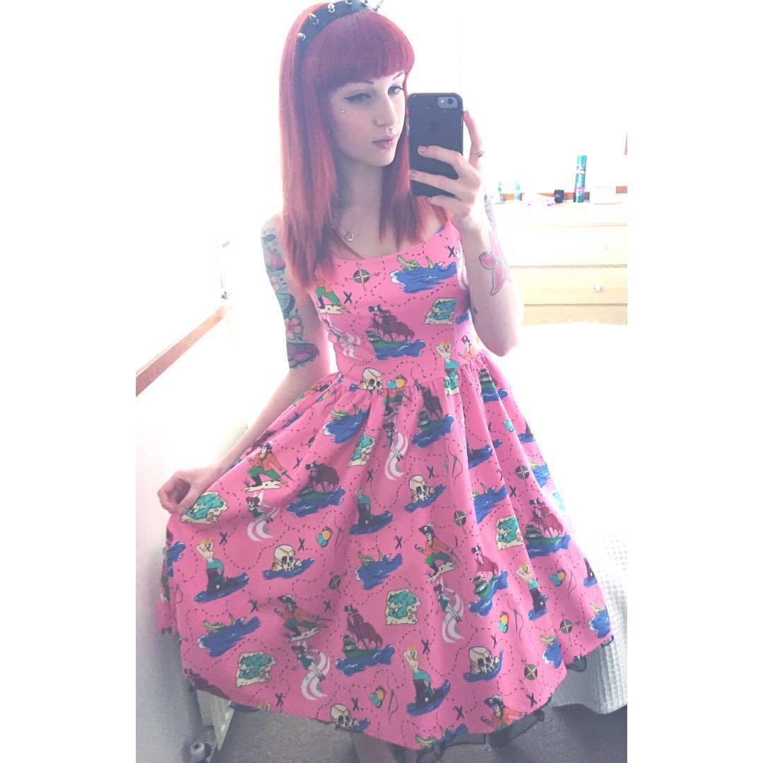 momentsforeverfaded:  All ready in my Pin Up Girl Clothing  Neverland print dress