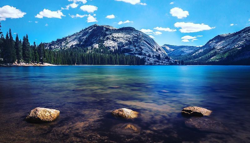 3 rocks. A beautiful lake in yosemite I stopped and went for a swim in at around 10,000 ft. 🌲🌲🌲 #travel #yosemite #nationalpark #blog #rocks #water #calm #greatview #forest #mountains #lake #niceswim #photo #instagood #composition #photooftheday...