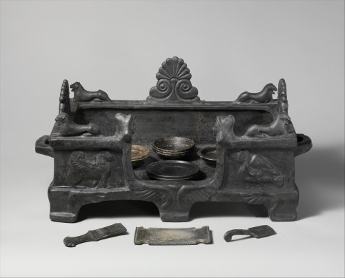 dwellerinthelibrary:An Etruscan offering tray ornamented with a sphinx and a siren. At the Met.