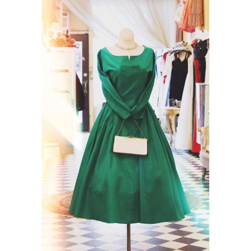 Green vintage is definitely something to be envious about! www.cabaretvintage.com/dresses/195