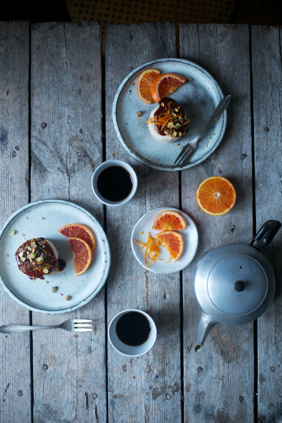 sweetoothgirl:  Gluten Free Fluffy White Chocolate Cakes with Orange, Caramel &amp;