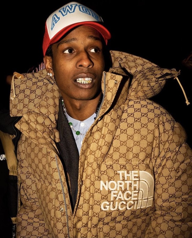 xfvckingdopex:Asap Rocky in NY wearing the The North Face Gucci allover GG down bomber