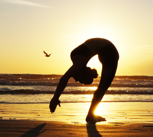 Sunrise Yoga at the Beach. There is nothing quite like that first deep backward bend of the day. Pho