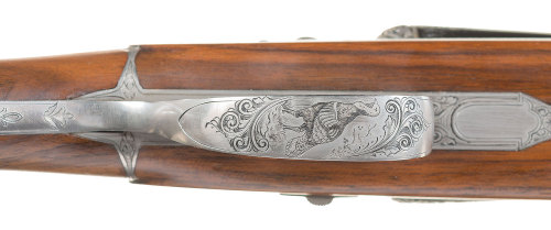 Factory engraved Darne V22 sliding breech double barrel shotgun.