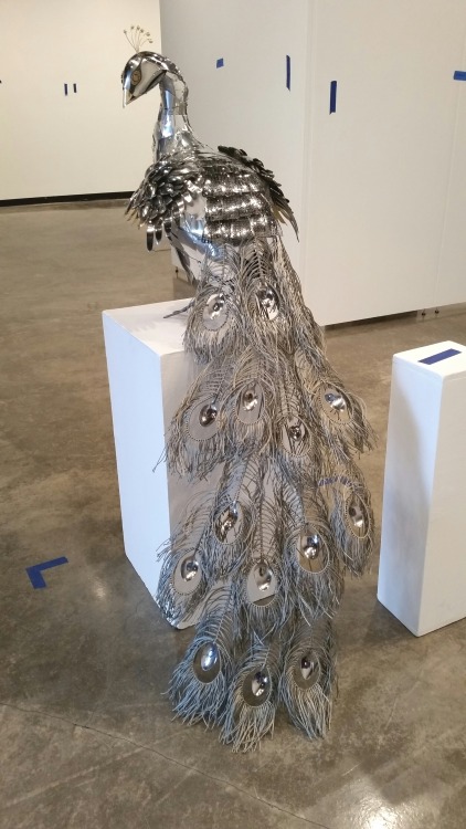 steampunktendencies:    Life-sized Peacock Sculpture made of spoons and other metal found objects by Liddlenomnom  