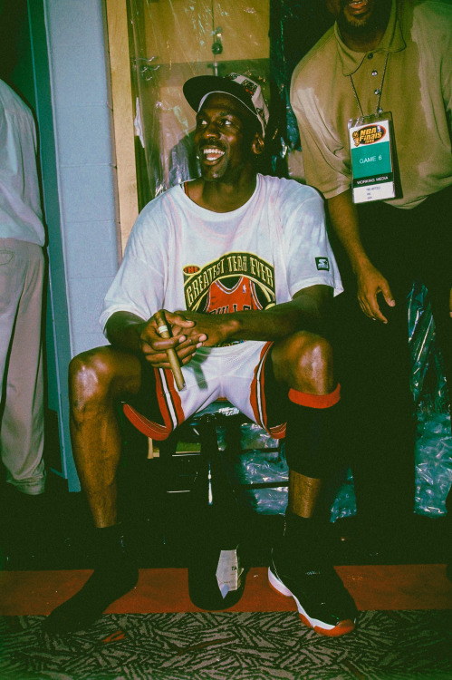 Michael Jordan photographed by Andrew D. Bernstein while celebrating defeating the Seattle Supersoni