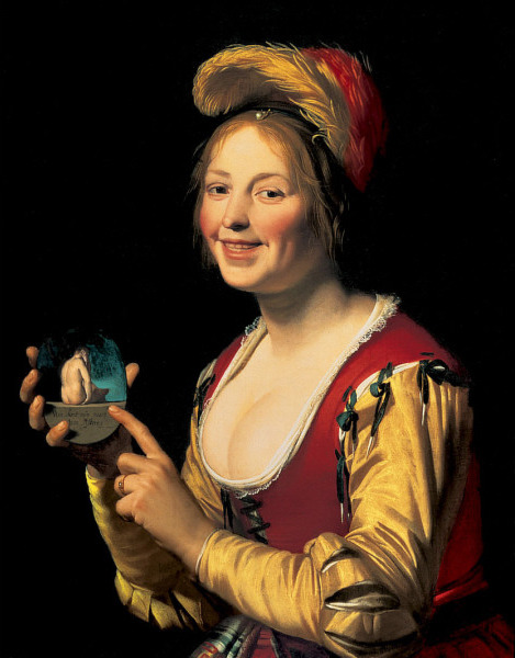 flemishgarden:Gerard van Honthorst - Smiling Girl, a Courtesan, Holding an Obscene Image1625oil on canvasSaint Louis, Missouri, United States