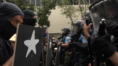 May Day in Puerto Rico: Police Attack Anti-Austerity Protesters with Pepper Spray & Tear GasThou