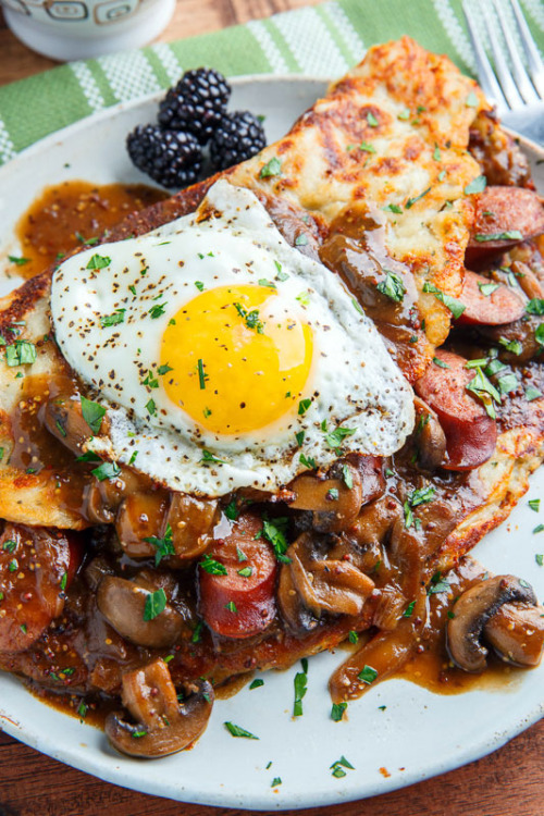 Boxty (irish potato pancakes) with bangers in a guinness mushroom and onion gravy