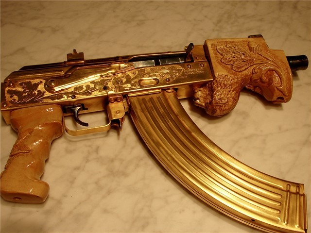 gunrunnerhell:  Bling?I think this started off as a Romanian Micro Draco Pistol but