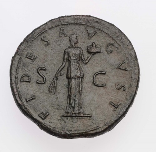 theancientwayoflife:~ Sestertius with bust of Plotina, struck under Trajan.Culture: RomanPeriod: Imp