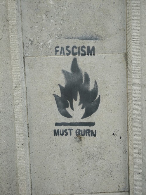 homojabi:[a stencil of black graffiti on concrete is pictured. in all caps it reads “fasc