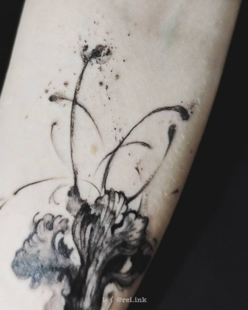 Underskin ink painting. Fragile flower for a fragile arm. Thank you for the trust with your first ta