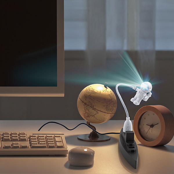laughingsquid:  Astronaut USB Light for Brightening Up Any Desk Space  I want a couple