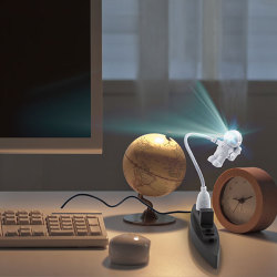 laughingsquid:  Astronaut USB Light for Brightening Up Any Desk Space  I want a couple of these