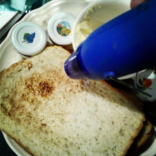 Post-Thanksgiving midnight barn snack: homemade bread toasted with a heat gun.