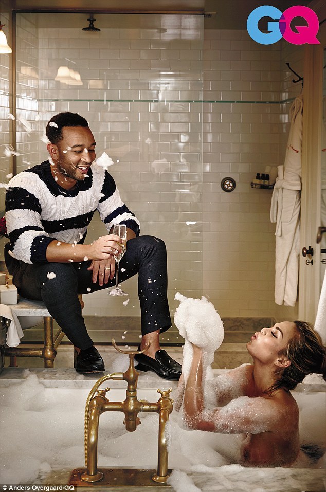 celebritygossipbyrangi:John Legend and his wife, Chrissy Teigen pose together in