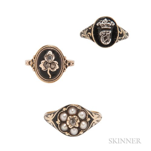 Three gold and enamel rings, two with diamonds, one with seed pearls (at Skinner)
