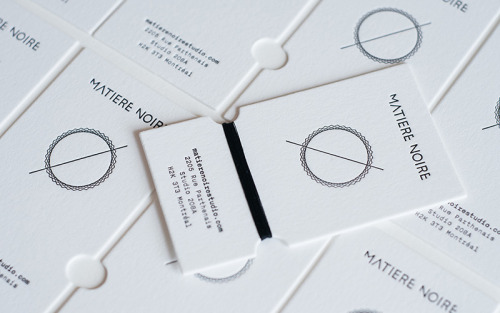 Fashion studio Matière Noire has perfect hand-wrapped die-cut business card designed by Burak Kaynak