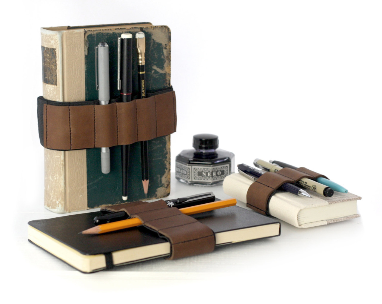 stuffguyswant:Handmade Journal Bandoliers by Emily Oinen  Designer Emily Oinen from
