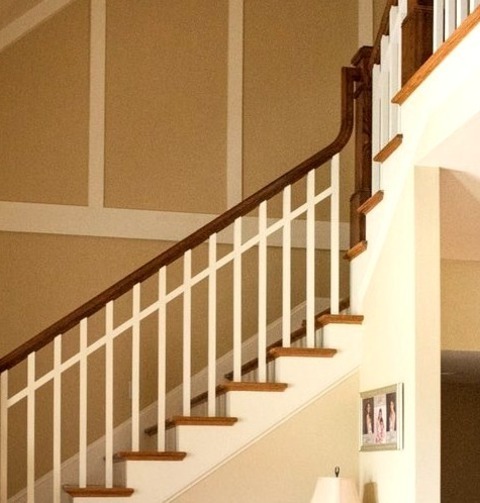 Craftsman Entry - MudroomLarge Craftsman Entryway With A Light Wood Floor, Beige Walls, And A Dark Wood