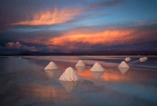 nubbsgalore:according to legend, the mountains in the andes once walked and acted like humans. one of them, tunupa, was a female who lived with her husband and three children. when one of her children died, her husband left her, taking with him the other