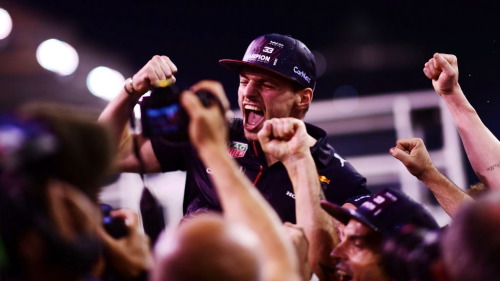 2021 F1 World Drivers Champion Max Verstappen Celebrates With His Team After The F1 Grand Prix Of Abu