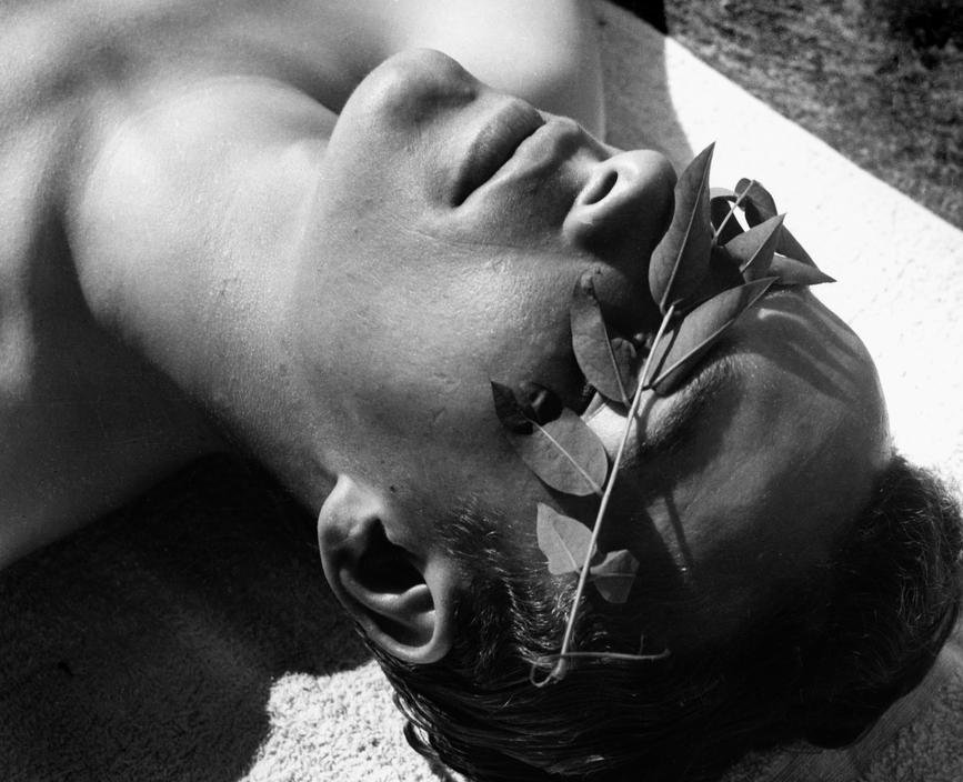 myheadhurtsbadly:  Young man with laurel over the eyes Taken by: Herbert List 