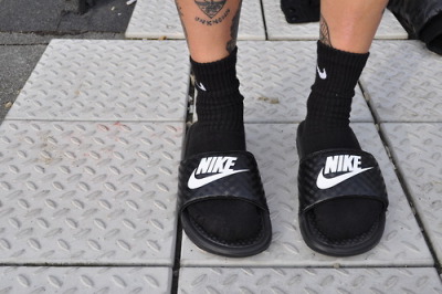 nike slides on feet