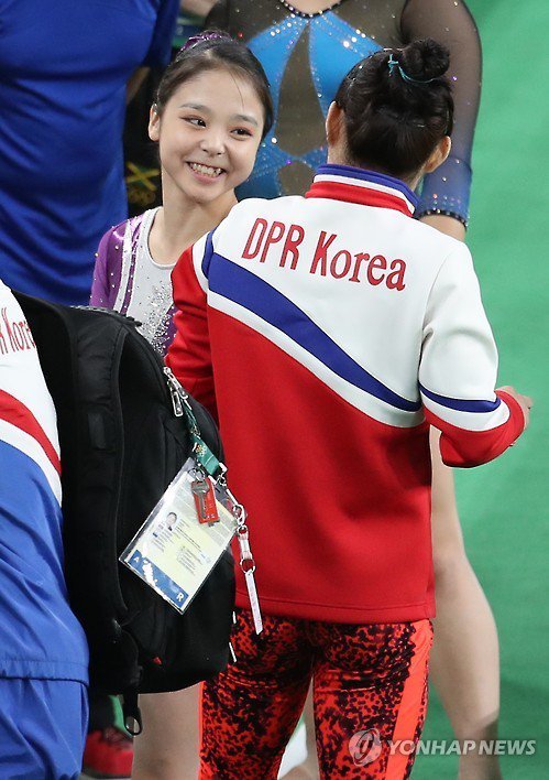 micdotcom: North Korean and South Korean gymnasts took a selfie together in Rio