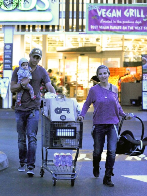 Chris Hemsworth carried his daughter, India while food shopping at Whole Foods in Venice, CA with wi
