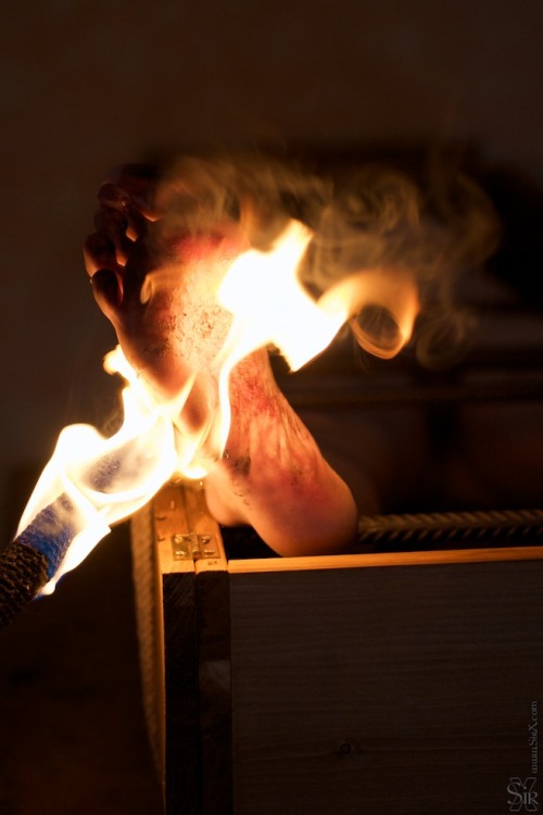 sir-x-art:Foot Burner - In history foot burners have been criminals that used a candle to burn someo