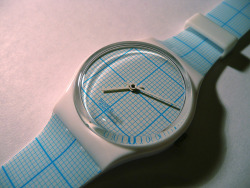 nolancorbin:  Graph Paper by Laura Moncur on Flickr. I still can’t believe I actually own this watch. It wasn’t easy to find, because it was an exclusive release for Swatch club members. Fortunately I found it on eBay. The packaging alone is unreal.