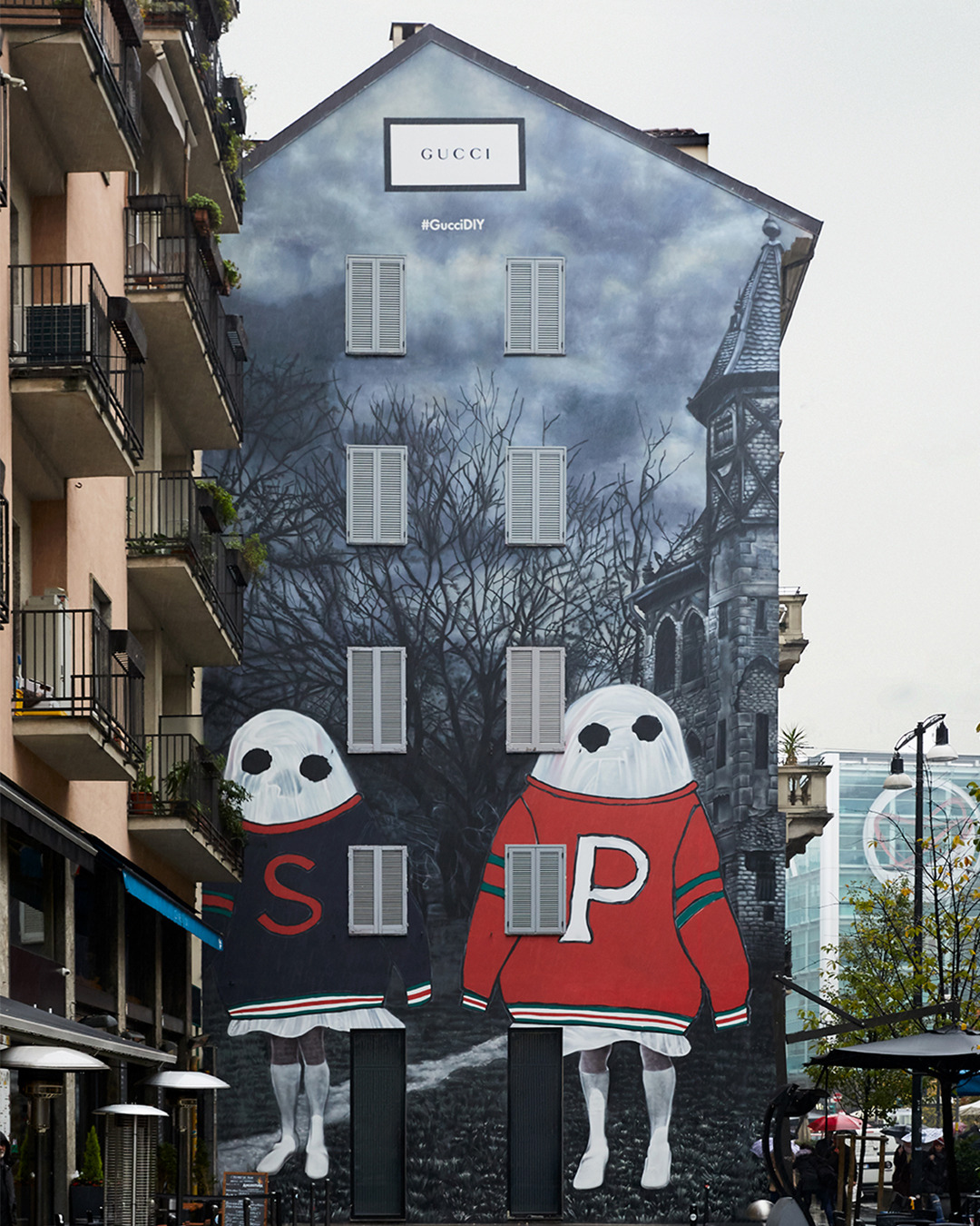 Ghosts go BIG w/ Gucci art wall in Milan!!!!!!