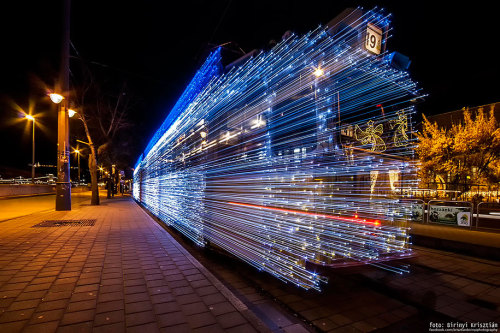 archiemcphee:  Each year during the Christmas season in Budapest, Hungary the city trams are each decorated with over 30,000 bright, twinkling LED lights.  “The tradition began in 2009 and has been a hit with passengers ever since. The lit up trams