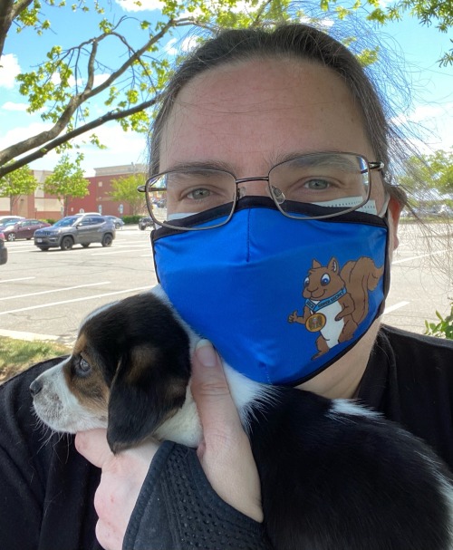 The Wife holding puppy. when we first met