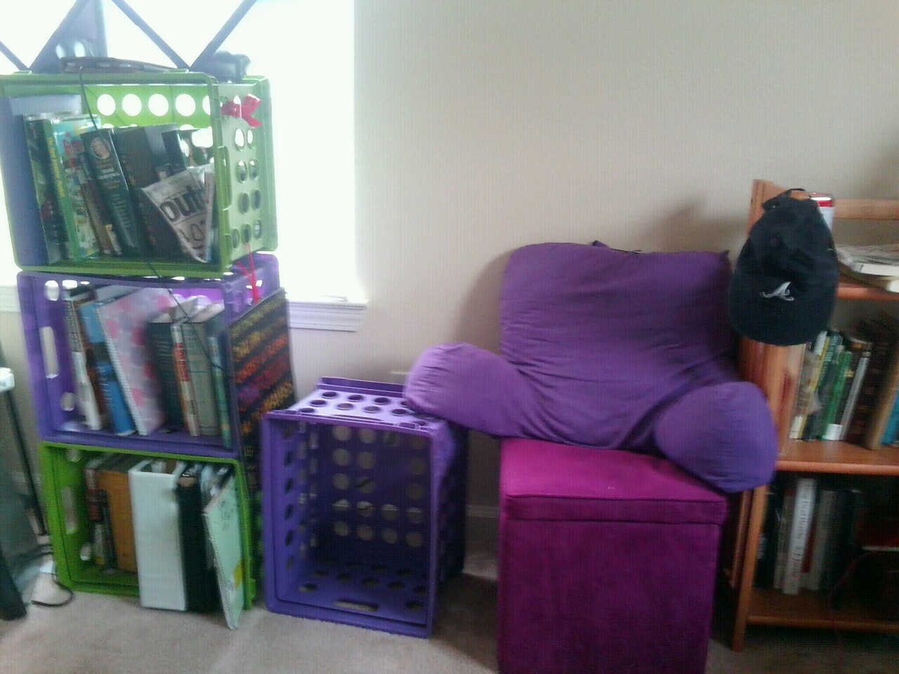I made a reading corner :)  And i have two more bookshelves in my room. Can we just