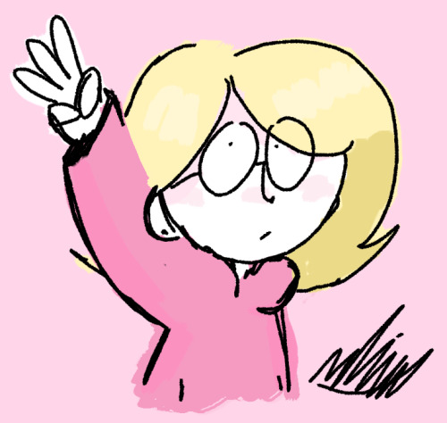 Ellie holding up three fingers.
