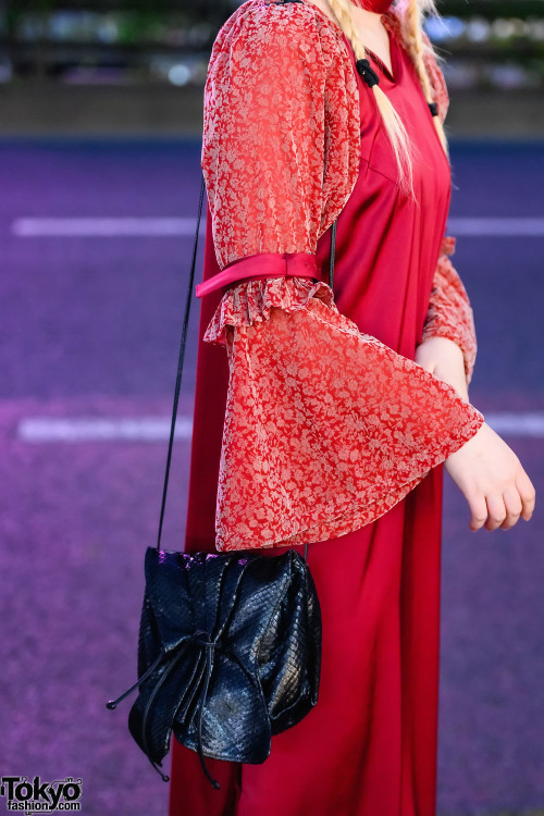 20-year-old Japanese fashion designer Nana Miyashita wearing a buckle-and-flare sleeve dress by her 