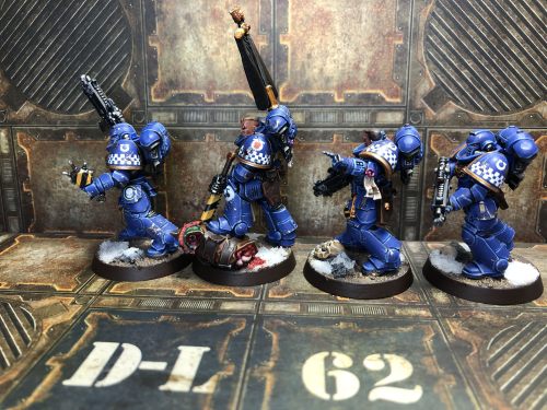 a-40k-author:cam2d:Ultramarines Intercessors, sans a guy who got melted by plastic glue.They’re perf